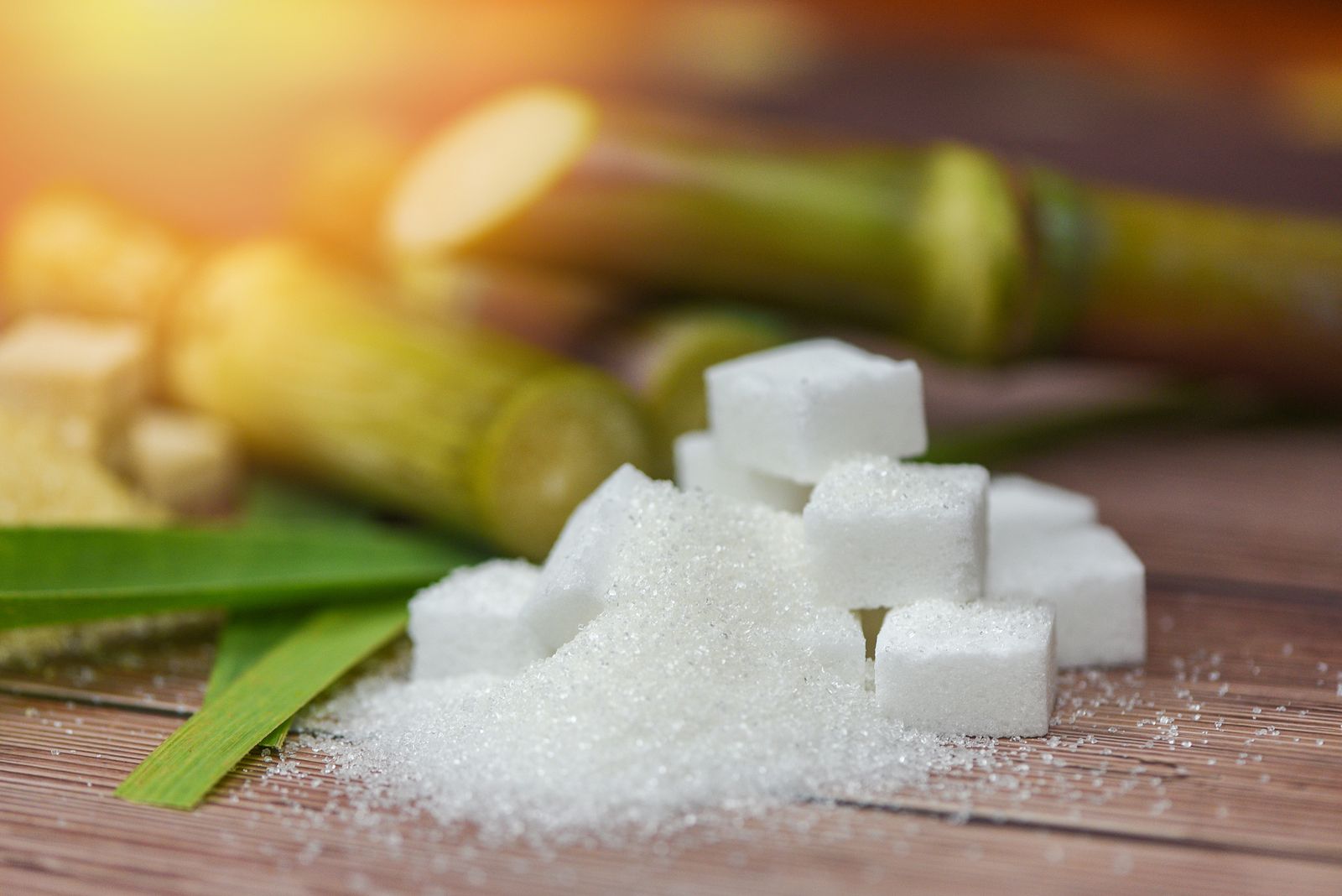 bigstock-white-sugar-cubes-and-sugar-ca-330811012